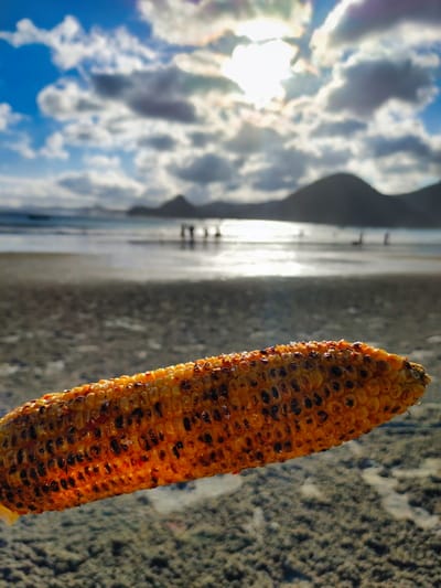 makan jagung di selong belanak beach